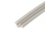 Three white plastic extrusion channels laid diagonally on a white background.