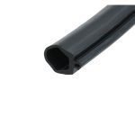 Close-up of a dark, hollow metal tube with a rounded end seen diagonally across the frame.