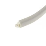 Close-up of a light gray curved plastic strip with small end tabs on a white background.