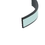 Close-up of a light blue curved object with a black textured edge, viewed at an angle.