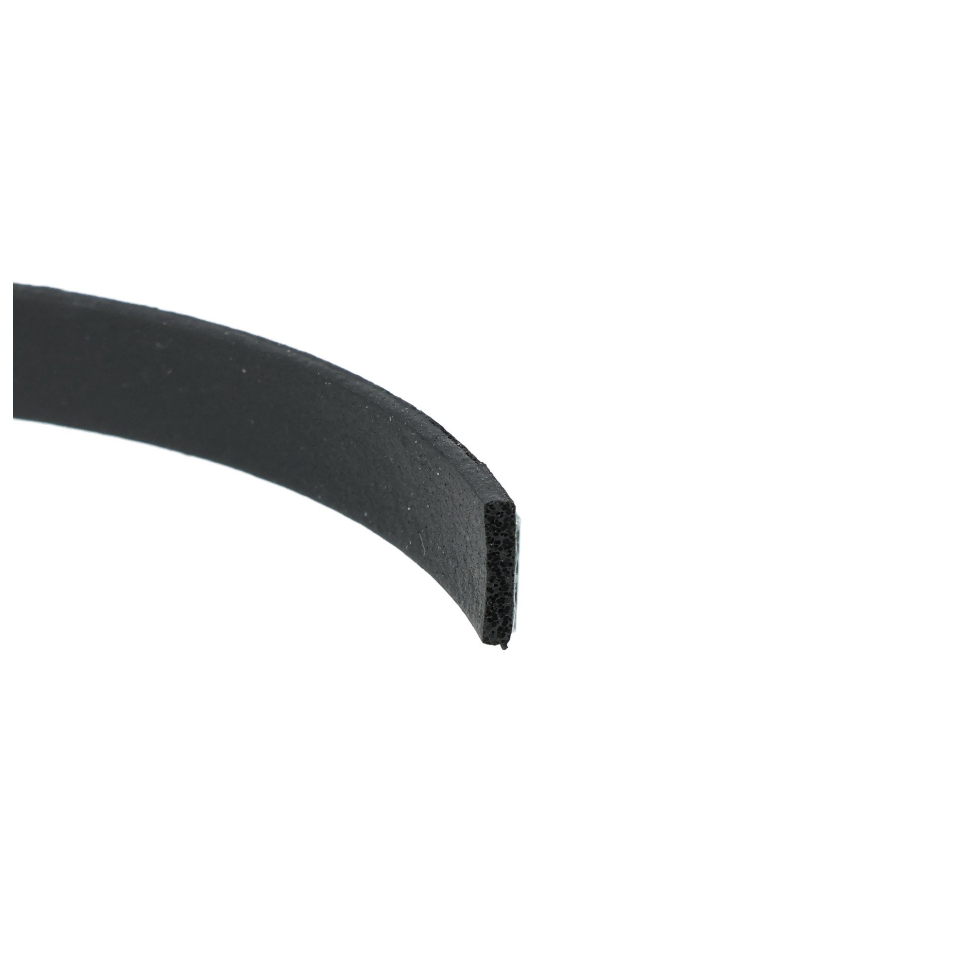 uszczelka-piankowa-samoprzylepna-2x8mm-czarna-04-504-1 - Centrum uszczelek Close-up of a black curved blade edge against a white background, showing a rough textured surface.