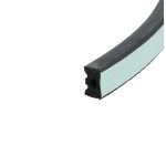 Close‑up of a black foam weatherstrip with a blue backing along a door frame edge.