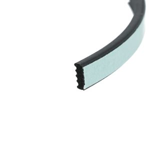 Close-up of a pale blue foam weatherstrip with a black rubber edge, curved in a circular arc