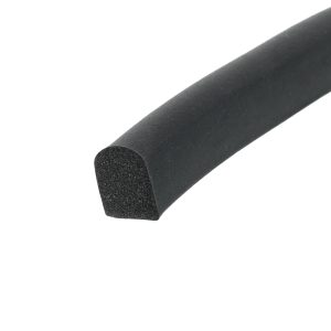 Close-up of a black foam pipe insulation tube, showing its porous end and cylindrical shape, angled diagonally across the image.