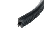 Close-up of a black rubber weatherstrip with ribbed surface and hollow channel, curved along the edge.