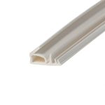 Close-up of a white plastic extrusion with hollow channels, a frame profile viewed diagonally across the image.