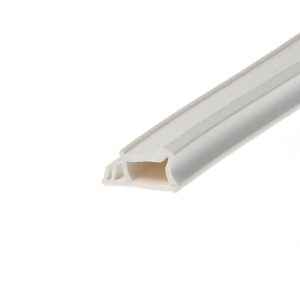 Close-up of a white PVC extrusion with a beige, hollow end, diagonally across the image.