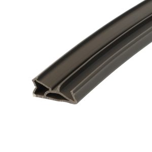 Close-up of a dark brown rubber weatherstrip with a V-shaped hollow cross-section, laid diagonally.