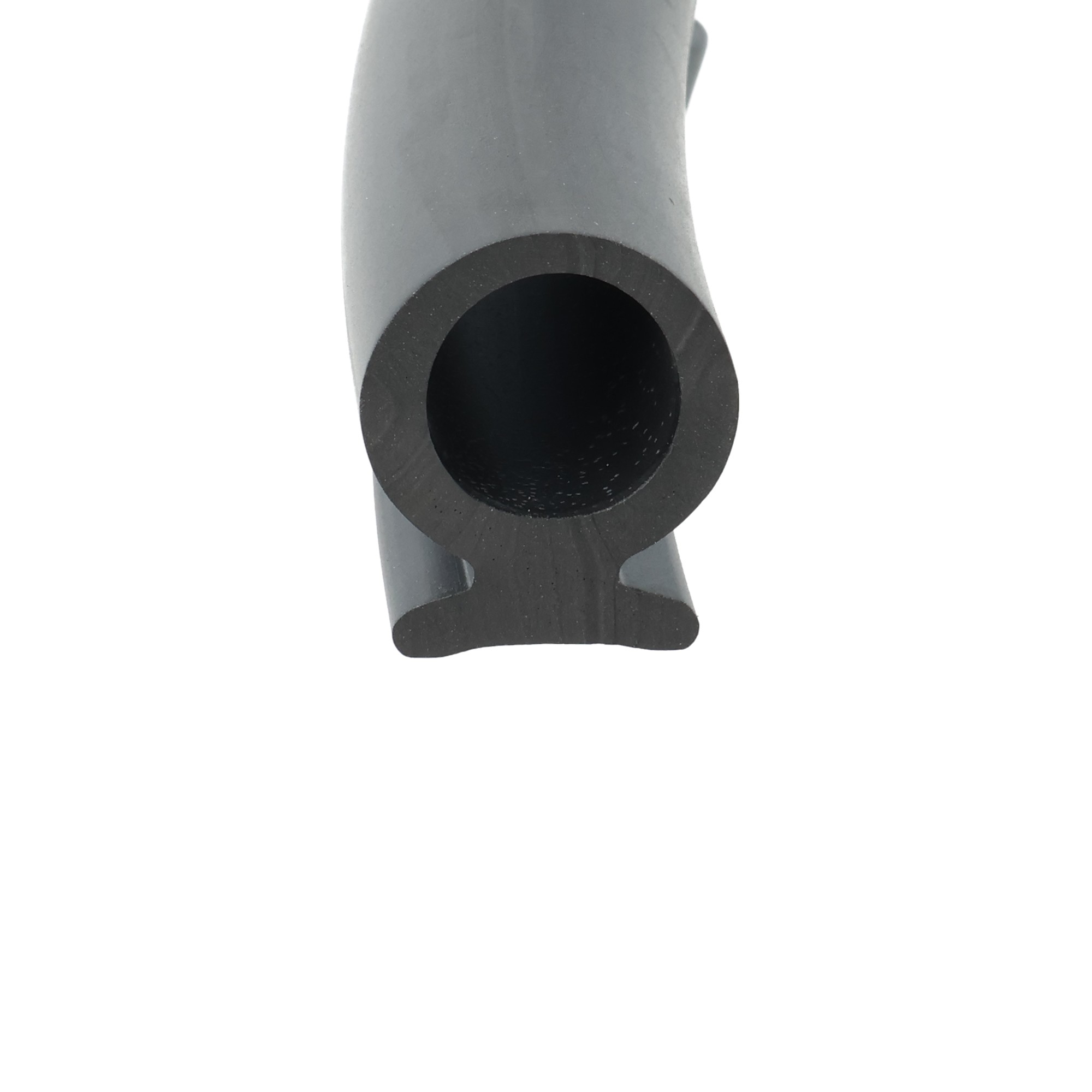 uszczelka-rolety-samochodowej-dolna-typu-omega-24-x-28-mm-gumowa-czarna-012133-3 - Centrum uszczelek Close-up of a gray gun barrel with a dark circular muzzle opening