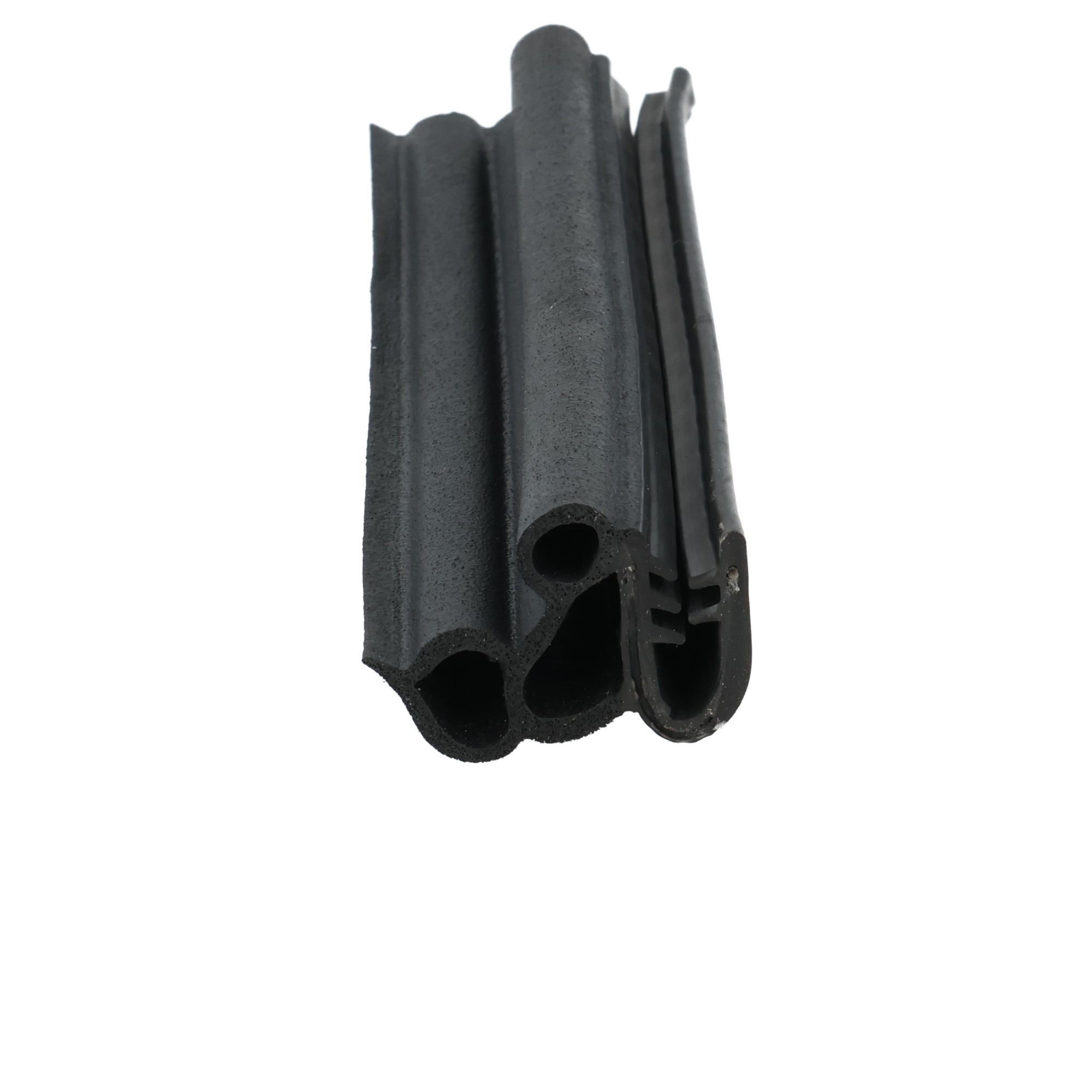 uszczelka-samochodowa-zaciskowa-na-krawedz-5-6mm-12-113-6 - Centrum uszczelek Close-up of a black plastic clip with multiple circular holes and ridged surfaces, viewed from the side.