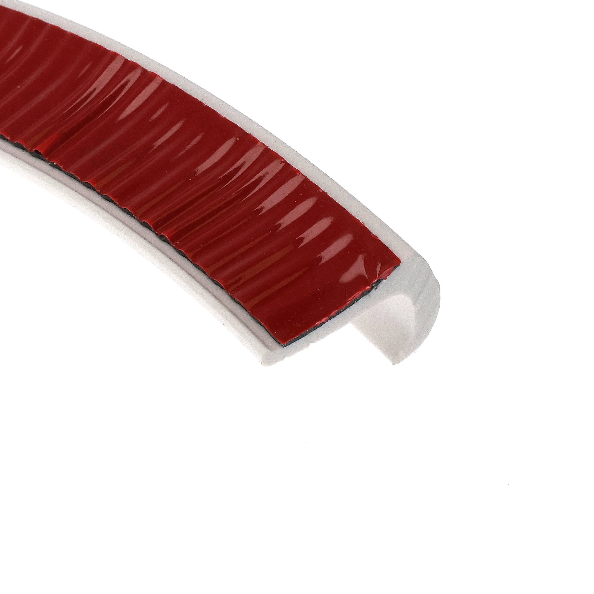 uszczelka-samoprzylepna-3m-okapnik-gumowa-13-x-23mm-biala-07999-1 - Centrum uszczelek Close-up of a red-wrapped candy bar portion on a white background.