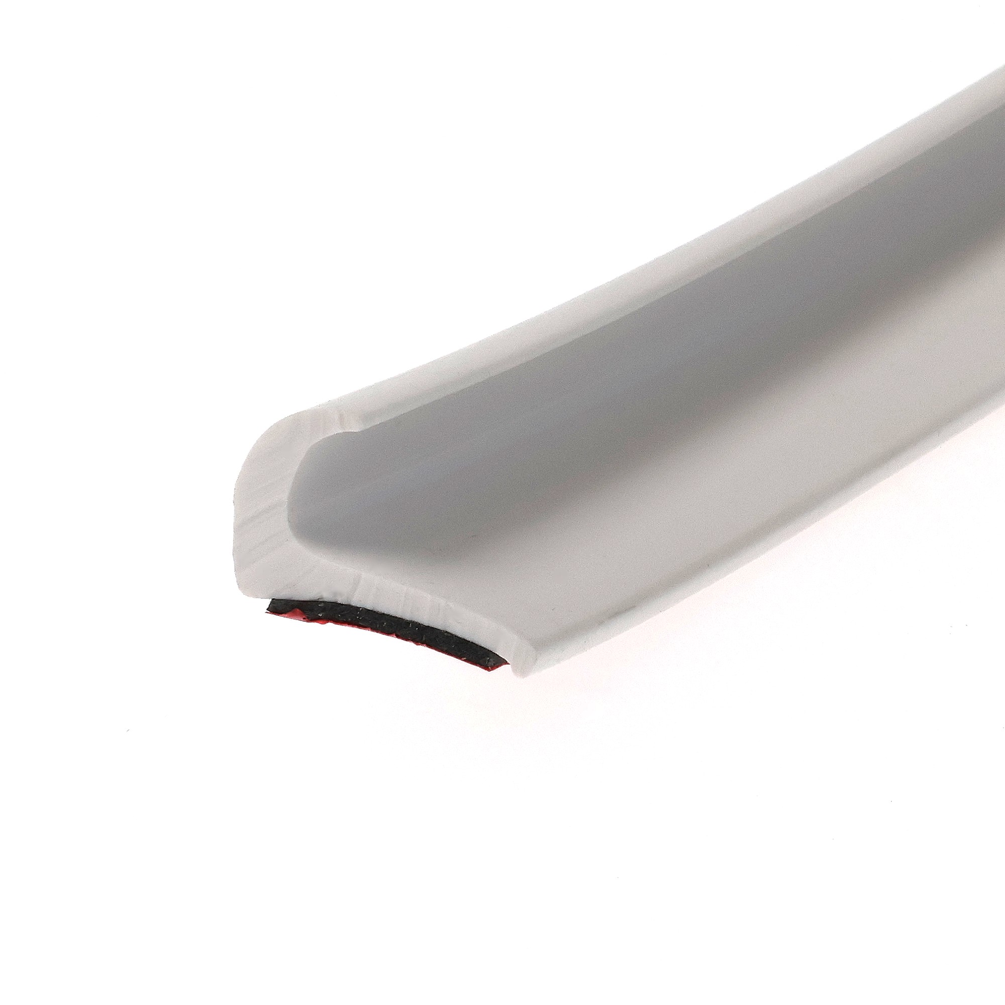 uszczelka-samoprzylepna-3m-okapnik-gumowa-13-x-23mm-biala-07999-4 - Centrum uszczelek Close-up of a white plastic object with a rounded edge and a small red detail on a white background.
