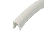 Close-up of a white textured corrugated pipe, curved diagonally across the frame.