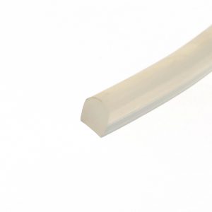 Close-up of a beige plastic corner or edge of a rectangular object set against a white background, oriented diagonally across the image.