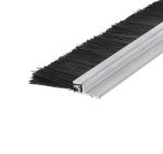 Close-up of a black bristle brush attached to a silver metal rail, angled diagonally across the image