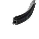 Close-up of a black curved rubber seal with multiple grooves and a hollow cross-section