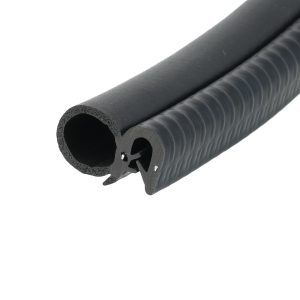 Close-up of a black foam tube showing a hollow circular cross-section and textured outer surface with ridges