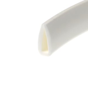 Close-up of a white ceramic mug with a pale yellow interior seen from the side.