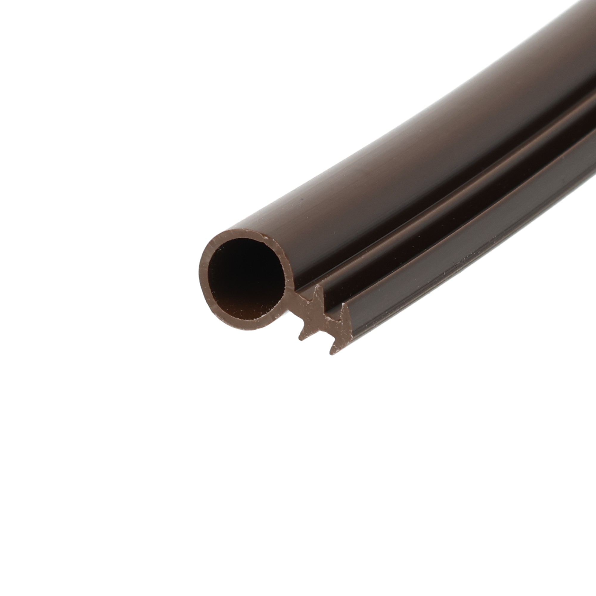 Uszczelka renowacyjna do okien i drzwi fi 8mm brązowa 12-11165-1 2 - Centrum uszczelek Close-up of brown plastic tubing showing a circular hollow cross-section.