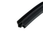 Close-up of a black metal rail/profile with a rounded, grooved channel and slot, likely a linear guide or rail component
