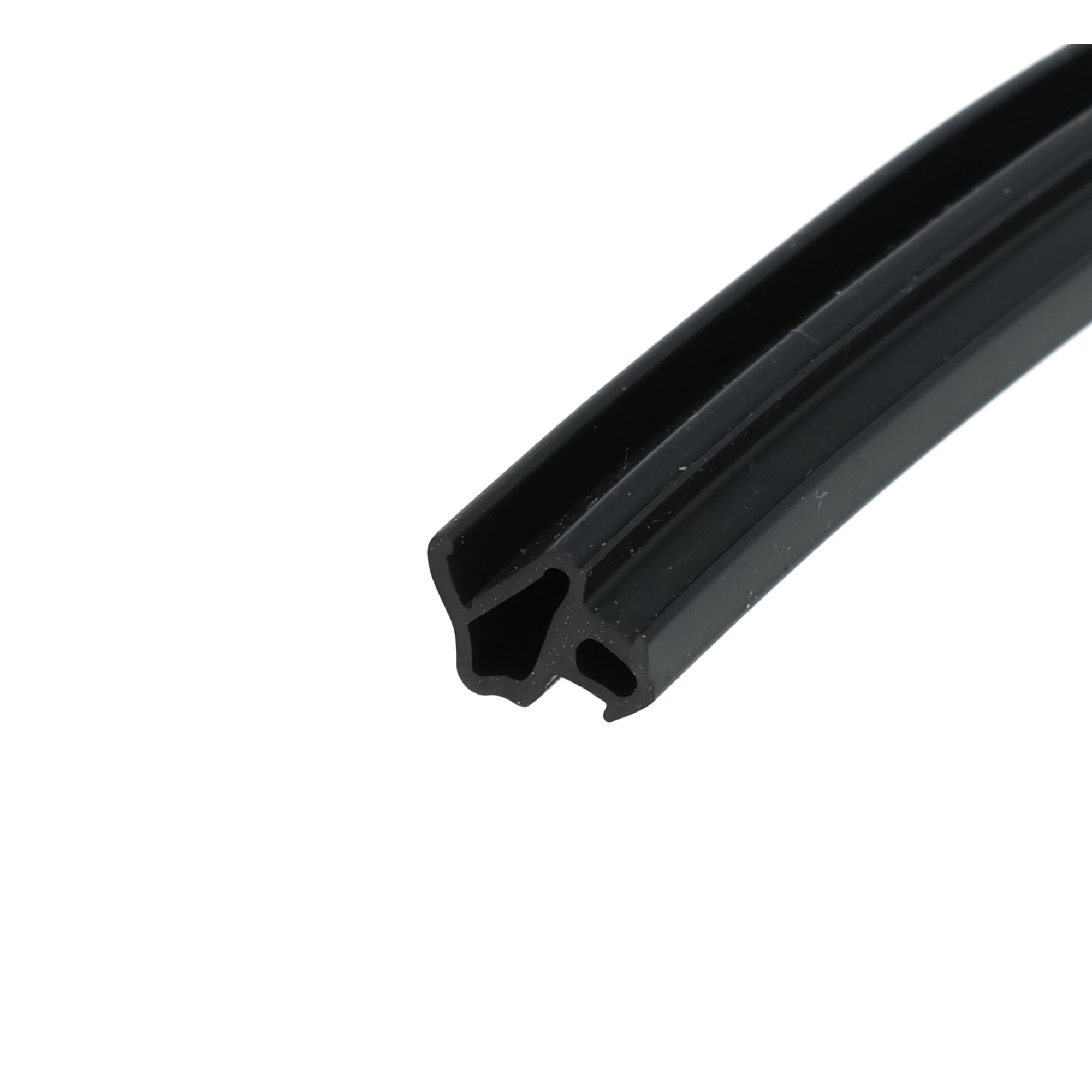 uszczelka-do-okien-pcv-s-1172-04-172-3 - Centrum uszczelek Close-up of a black metal rail/profile with a rounded, grooved channel and slot, likely a linear guide or rail component