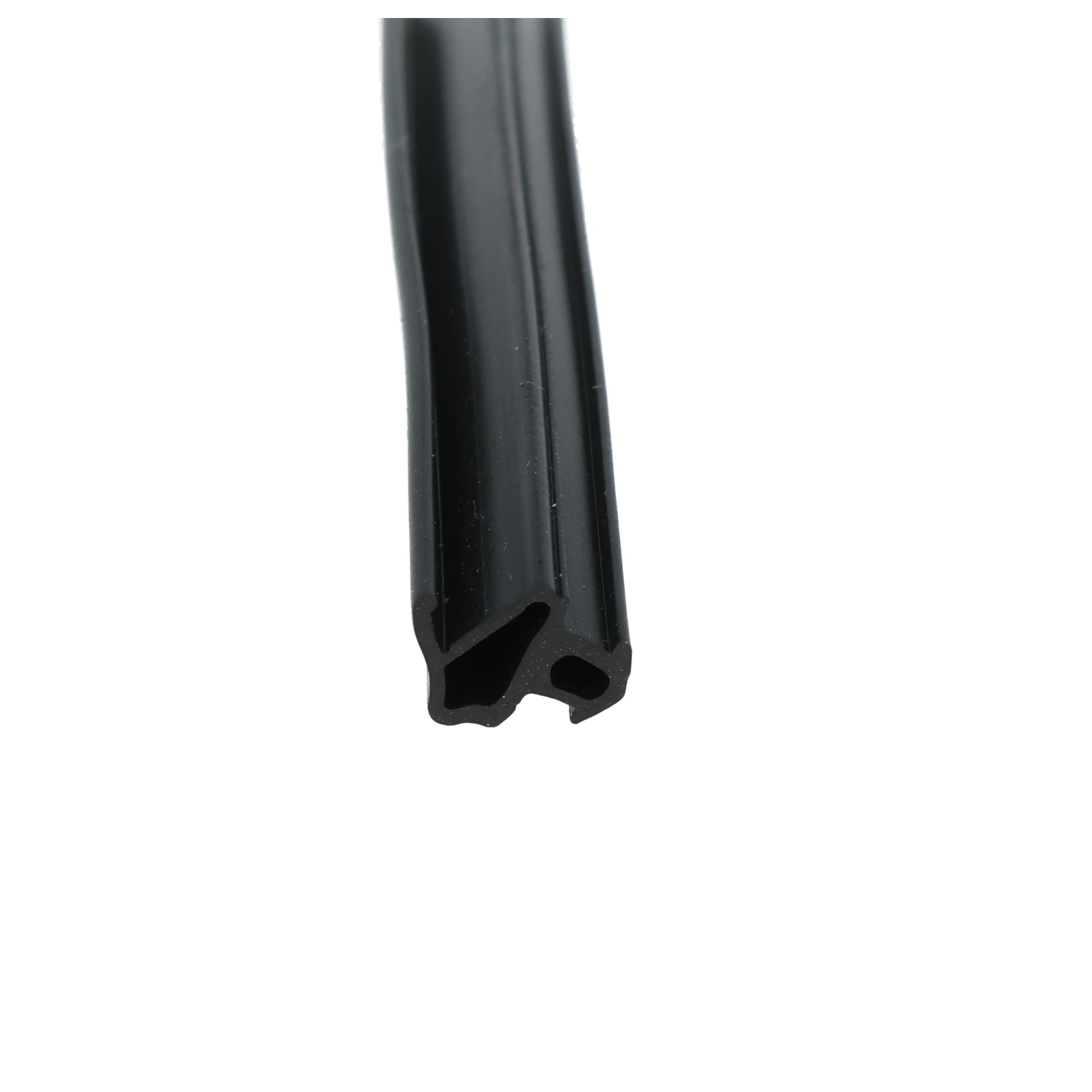 uszczelka-do-okien-pcv-s-1172-04-172-5 - Centrum uszczelek Close-up of a dark, curved plastic or metal strip with a perforated end against a white background.