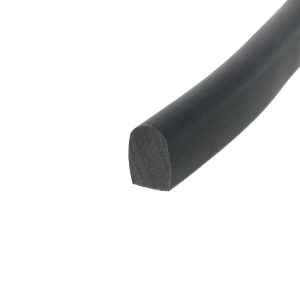 Close-up of a dark cylindrical rod or tube diagonally across a white background, showing a circular end face.