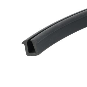 Close-up of a black curved rubber seal with a chipped, angular end and small scratches.