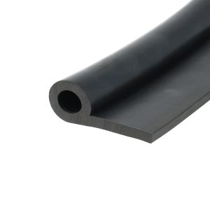 Close-up of a black cylindrical tube with a hollow center, angled diagonally across the image.