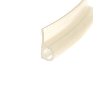 Close-up of a pale beige curved object with a rounded edge on a white background, abstract and minimal.