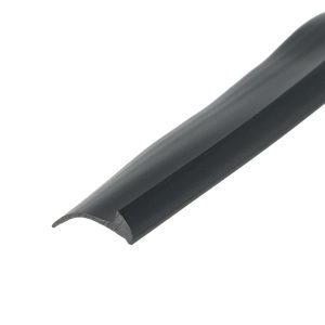 Close-up of a dark, curved edge trim or rail running diagonally across a white background, showing a smooth, glossy surface with a rounded edge at the bottom-left.