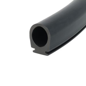 Close-up of a black hollow cylindrical tube with rounded end, viewed from the side at an angle.