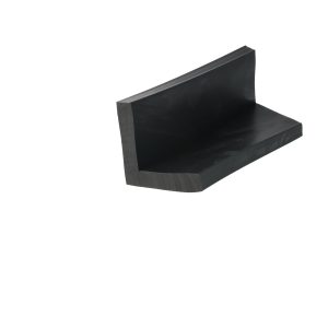 Close-up of a black wooden block with a stepped, right-angled edge forming a small corner notch