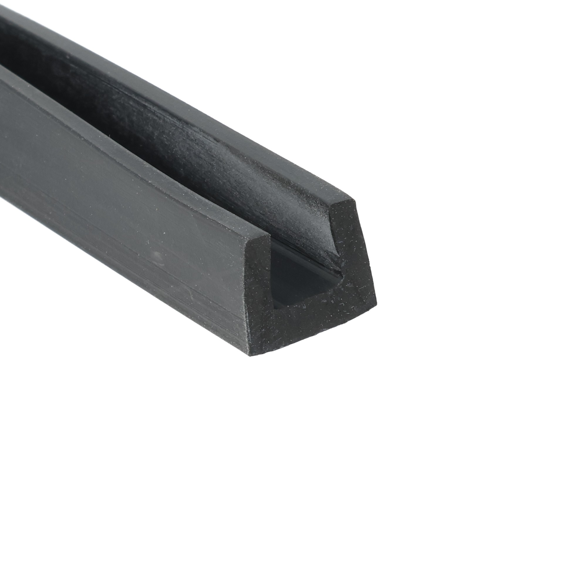 035372_3_3135 - Centrum uszczelek Close-up of a dark gray metal wedge with a beveled edge, likely part of a clamp or tool.