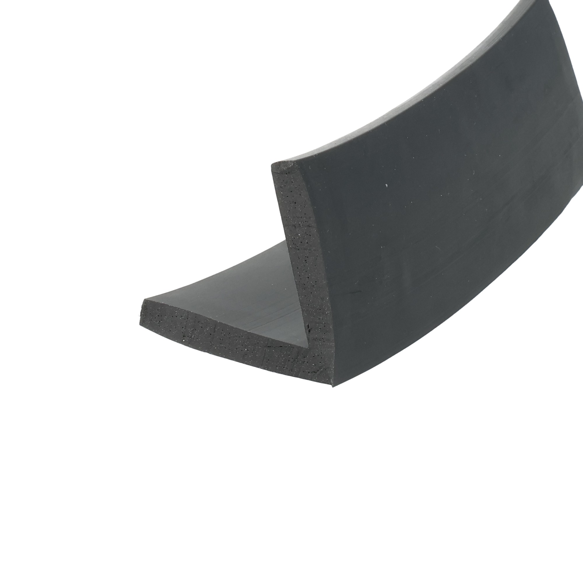 023353_2131 - Centrum uszczelek Close-up of a black curved foam piece with a rounded edge surface.
