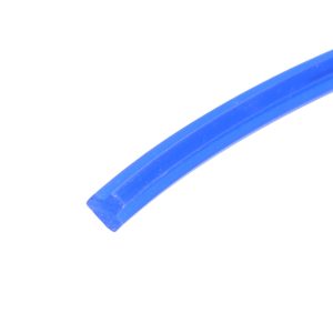 Close-up of a bright blue curved plastic strip diagonally across a white background.