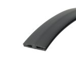 Close-up of dark rubber weatherstripping with a hollow U-shaped channel, curved edge visible at bottom-right.
