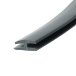 Close-up of a gray metal blade edge with a chipped tip, photographed at an angle against a white background.