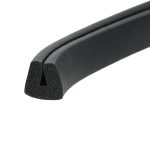 Close-up of black foam weatherstripping gasket with a hollow triangular cross-section and smooth exterior edge.