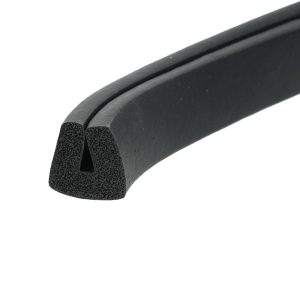 Close-up of black foam weatherstripping gasket with a hollow triangular cross-section and smooth exterior edge.