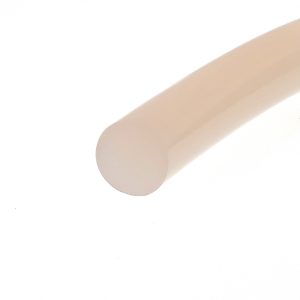 A light beige cylindrical object with rounded ends diagonally across a white background.