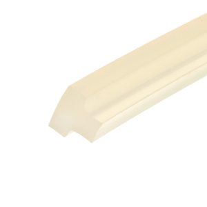 Close-up of a beige masking tape roll diagonally placed across the frame, partially unspooled