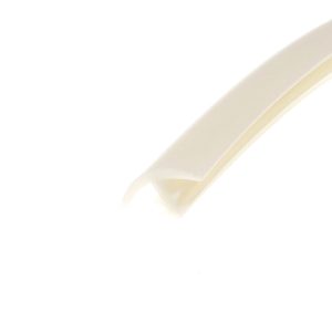 Close-up of a beige curved object diagonally across a white background.