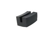 Close-up of a black curved block with a hollow U-shaped channel against a white background.