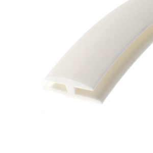 Close-up of a white rolled adhesive tape diagonally across a white background.