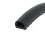 Close-up of a black foam roller tube with a hollow center on a white background, showing textured foam edge and red underside edge.