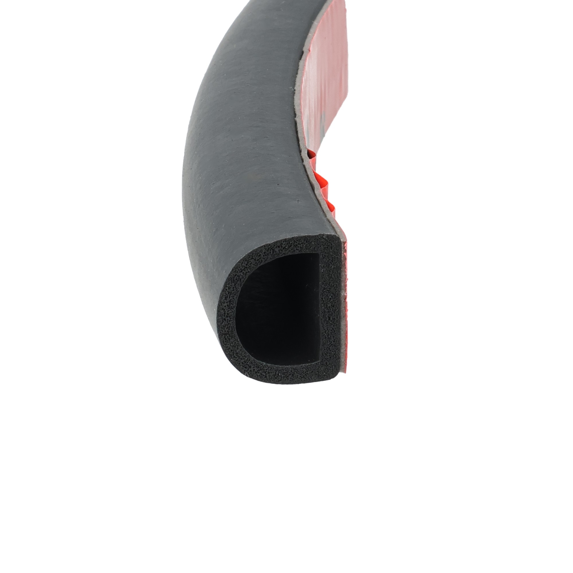 uszczelka-typ-d-z-klejem-3m-porowate-epdm-18x21-czarna-08-811-6 - Centrum uszczelek Cutaway view of a gray foam shoe sole with the red inner layer exposed along a diagonal edge