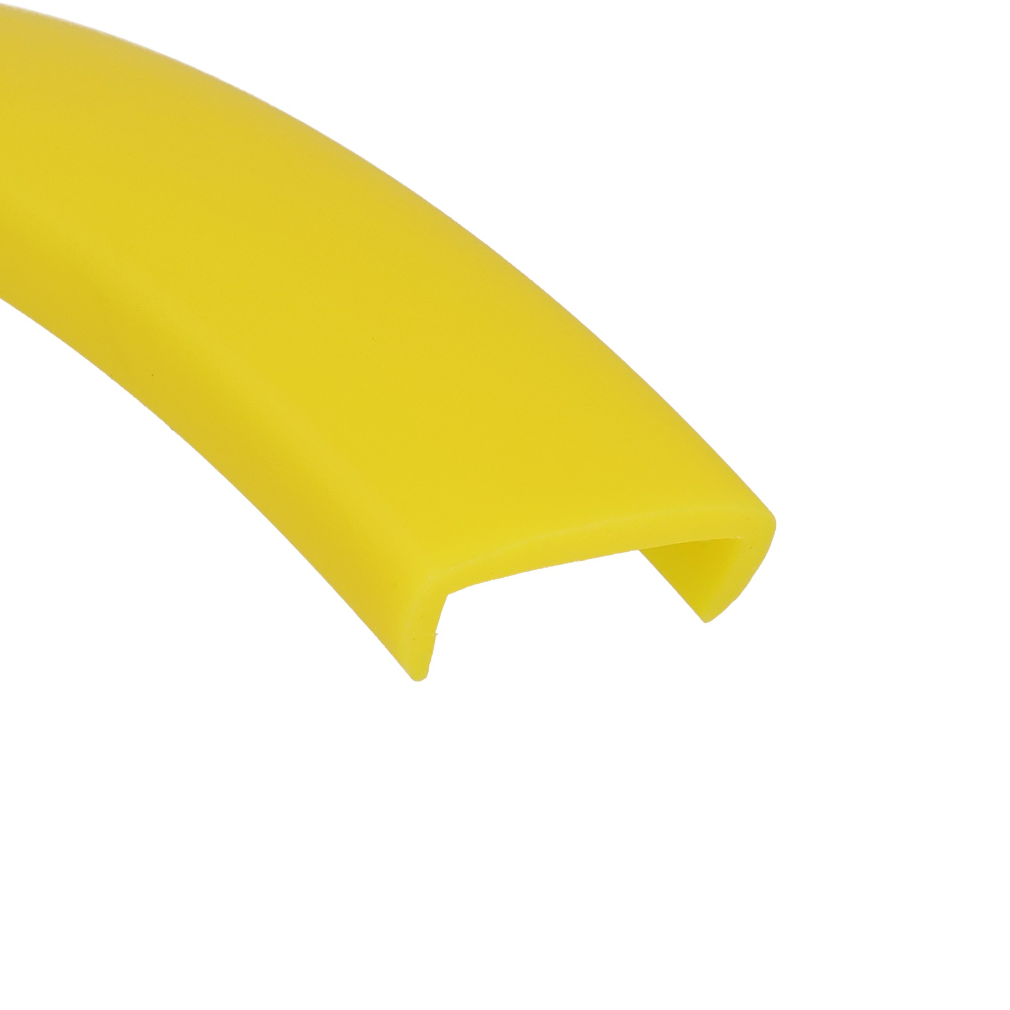 12-445_3162 - Centrum uszczelek Bright yellow diagonal strip with a rounded end against a white background, close-up detail of a plastic piece.