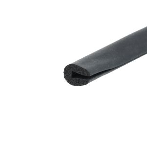 Close-up of a black foam sealing strip cut diagonally with a porous cross-section visible against a white background.