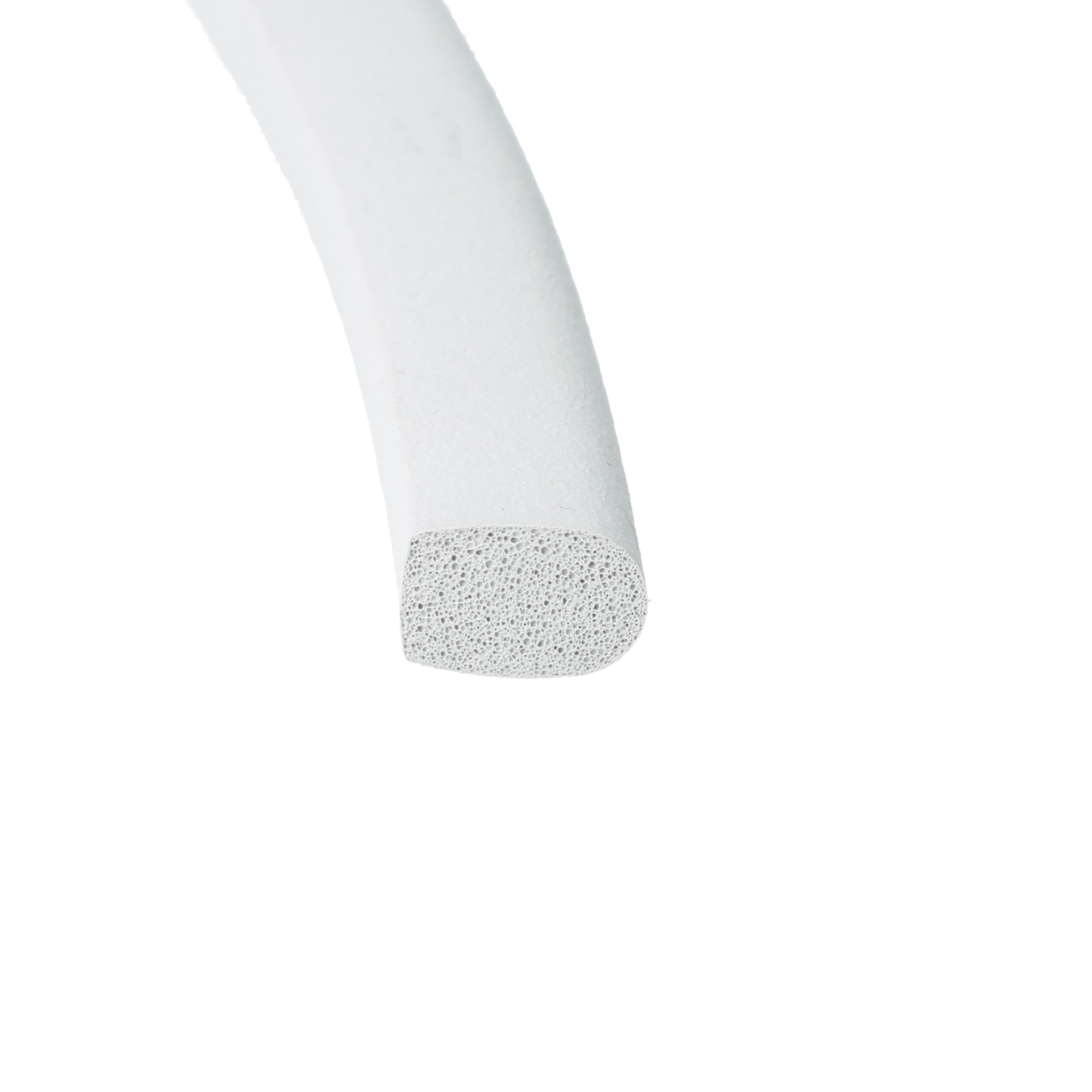 uszczelka-gumowa-pianka-typ-d-6-x-10mm-szara-046818-3 - Centrum uszczelek Close-up of a white foam cylinder with a porous, sponge-like tip against a white background.